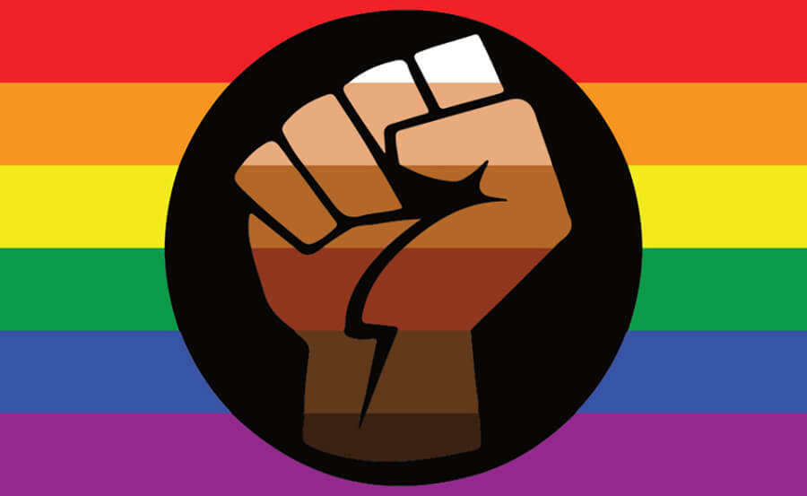 Queer people of color flag is shown, with various skin tones inside BLM symbol on Rainbow flag