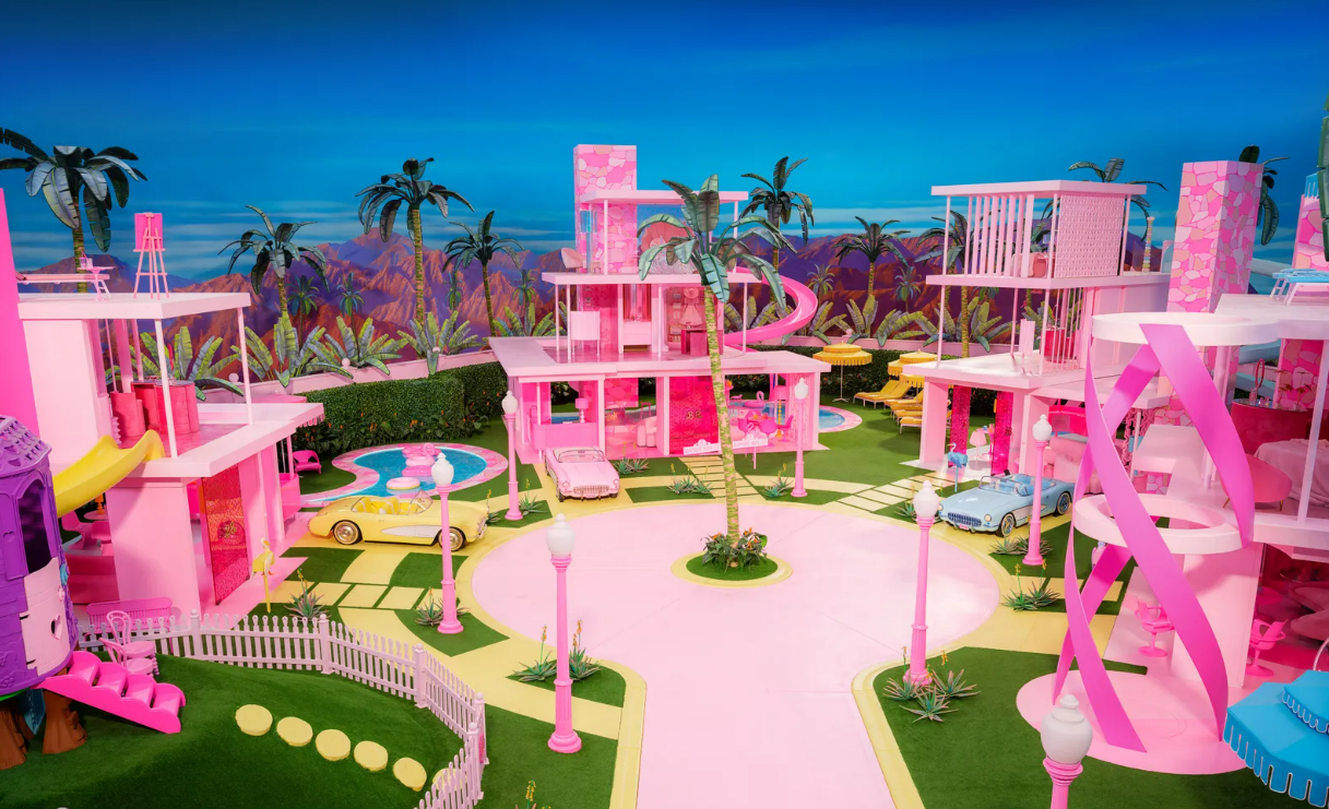 Wide pan view of Barbie's Dreamhouses from the 2023 film Barbie