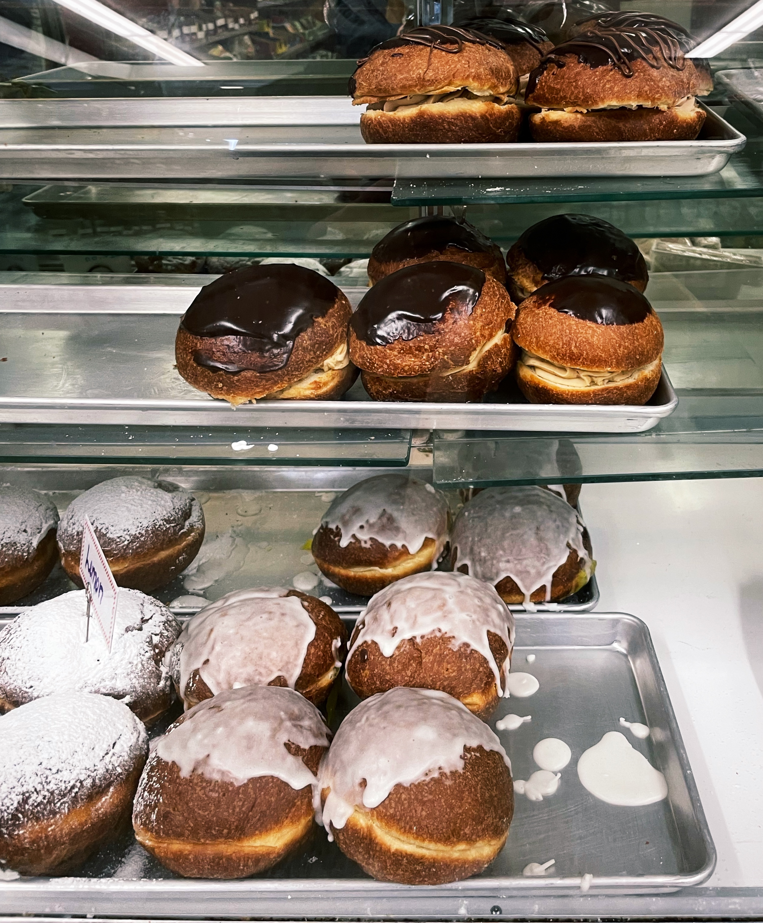 Paczki in a display case