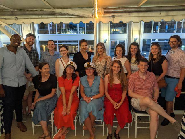 A group photo of the Alliance's Young Advisors taken on a boat